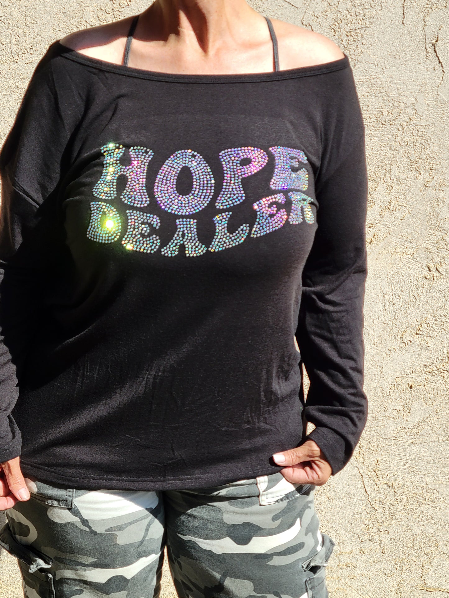 Off the shoulder long sleeve Hope Dealer shirt with wings on the back