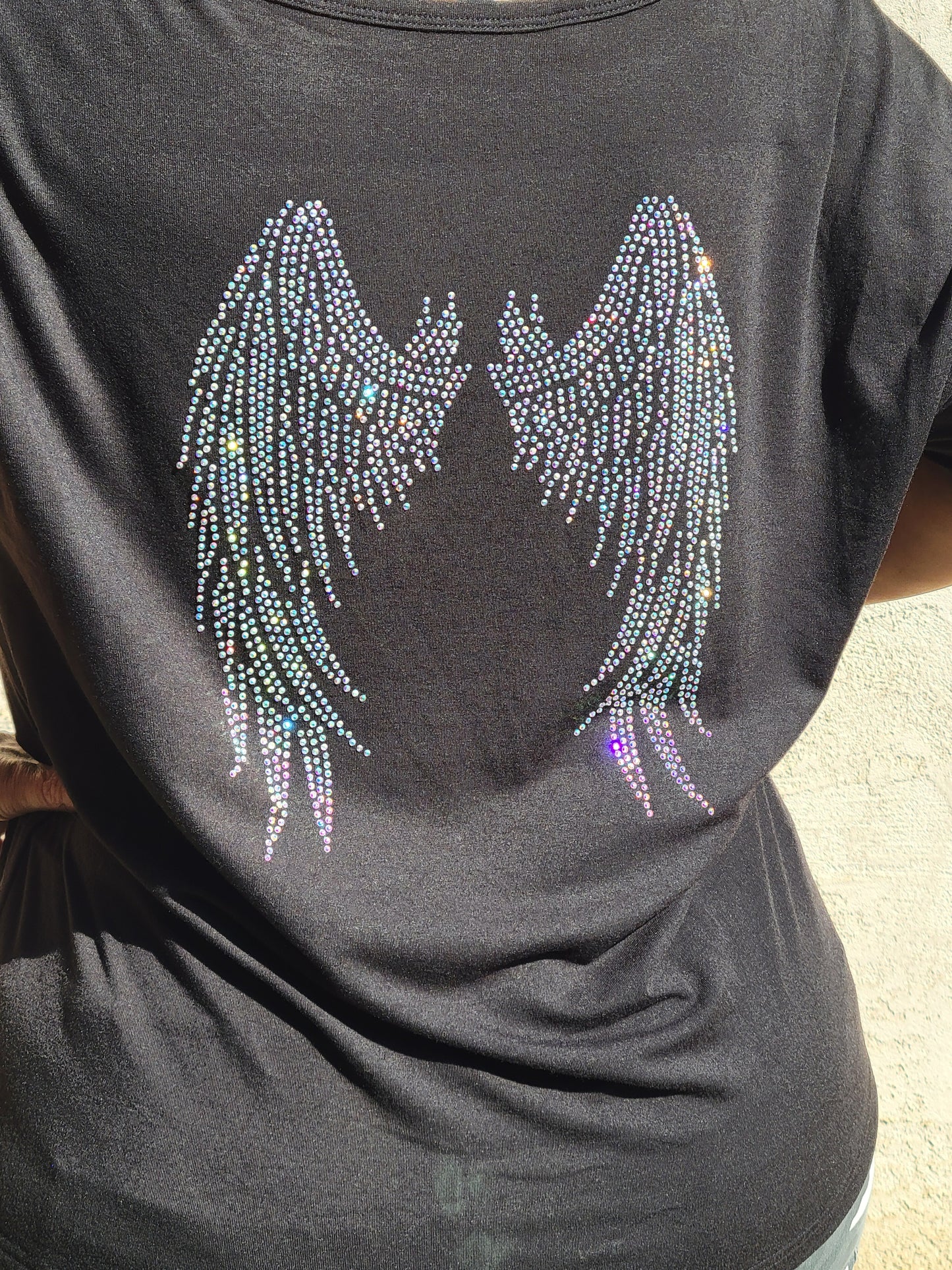 Off the shoulder long sleeve Hope Dealer shirt with wings on the back